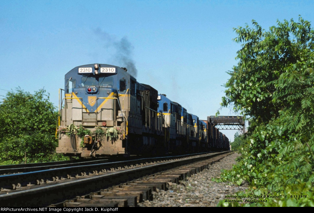 D&H, Delaware and Hudson U23B;s 2310-2306-2301-2314, with NE87 on the ex-Reading Line at Allentown, Pennsylvania. June 11. 1978. 